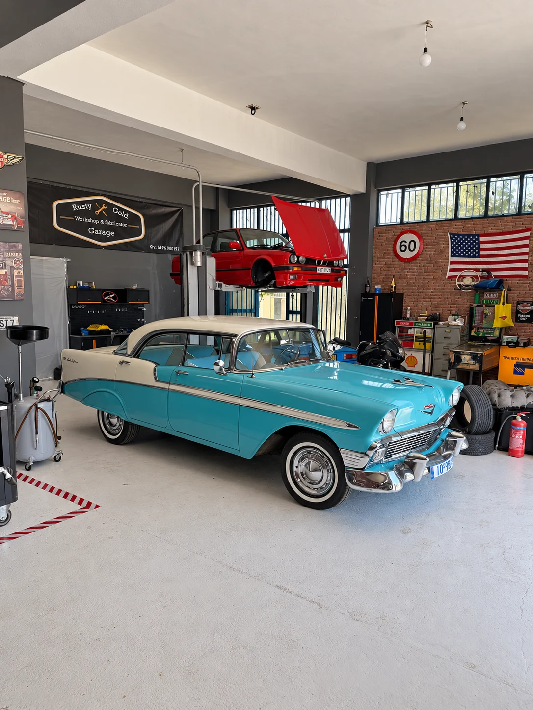 Turquoise and cream classic Chevrolet at Rusty Gold Garage